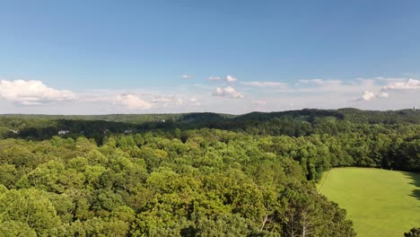 Aerial-of-green-country-farm-in-the-hills-of-Alpharetta,-Polo-Club-and-outdoor-event-destination,-Georgia