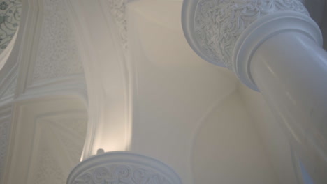 ornate white pillars and ceiling detail