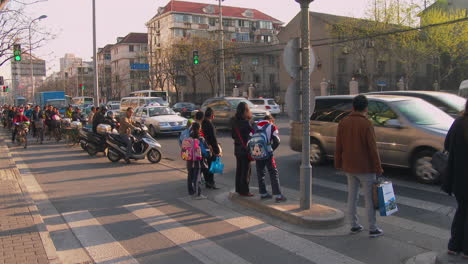 Traffic-passes-on-a-busy-Chinese-street