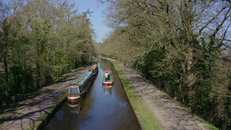 A-Narrow-Boat-heading-down-stream-to-Cross-the-Pontcysyllte-Aqueduct,-famously-designed-by-Thomas-Telford,-located-in-the-beautiful-Welsh-countryside,-the-Llangollen-Canal-route