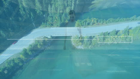 aerial view of road and forest with data processing animation overlay