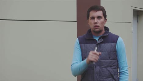 man vaping outdoors