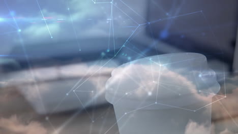 animation of network of connections over cup of coffee on clouds