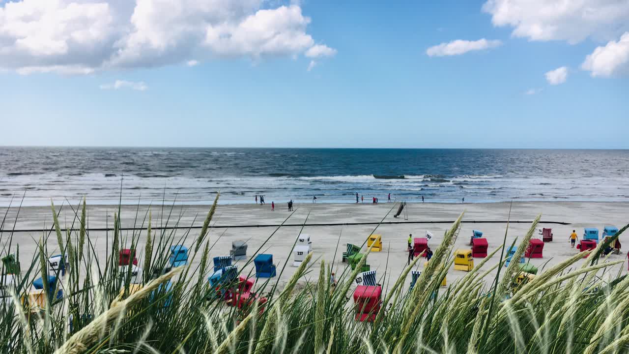 Beach Resort Panorama with Clouds and Waves