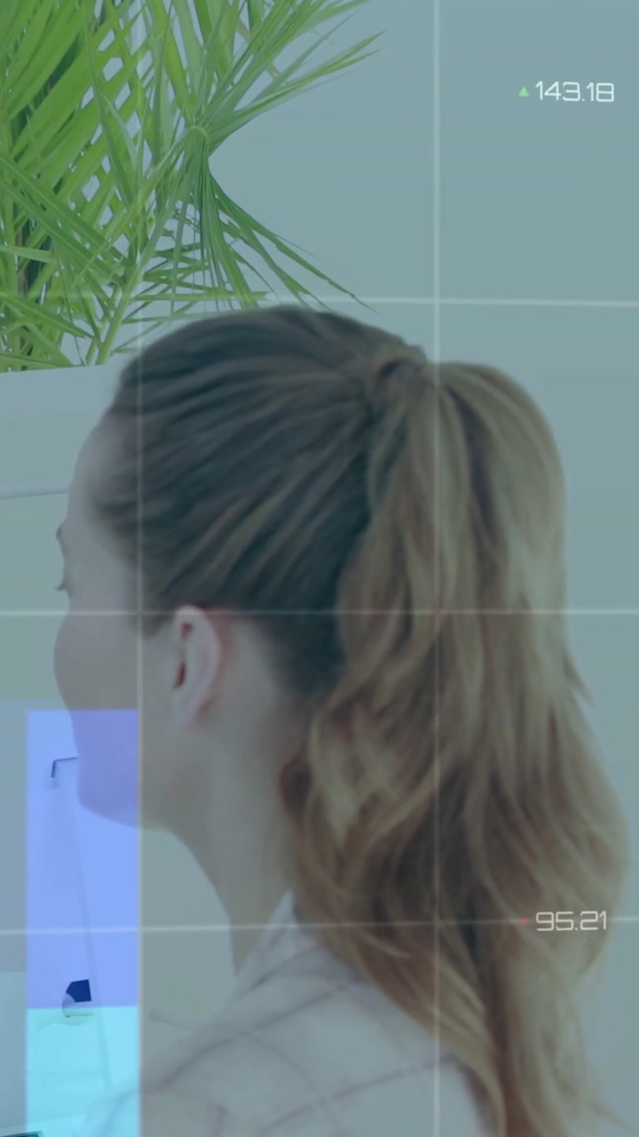 Vertical video: Grid fading in, woman lifting hand to temple and adjusting hair, tech HUD rising