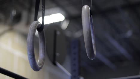 various shots of an athlete and equipment in a crossfit gym