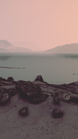 peaceful lake landscape with mountains in the distance