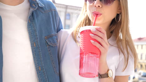 couple enjoying drinks outdoors