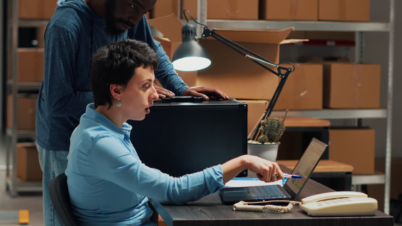 Business Employees Working in Warehouse Office
