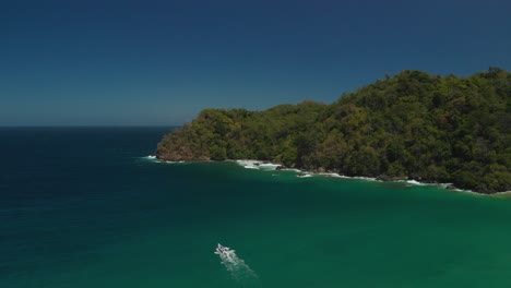 A-speed-boat-being-followed-by-a-drone-in-the-Gulf-of-Paria