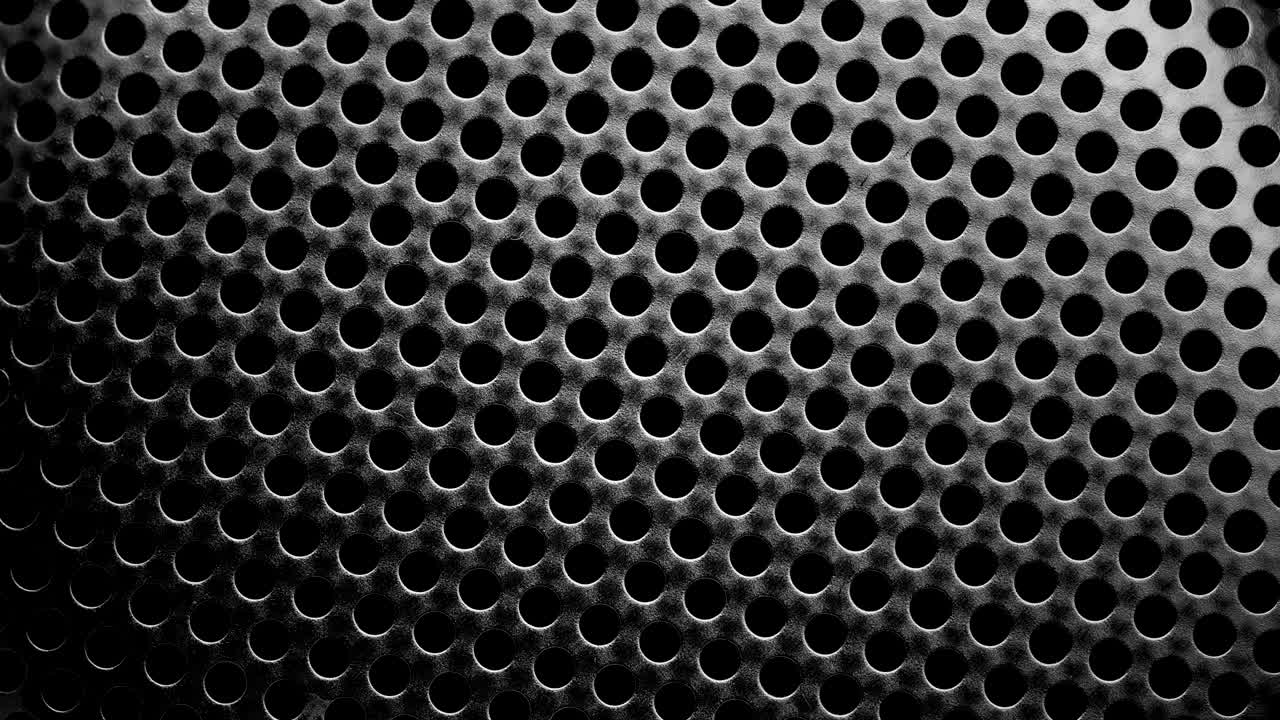 fondo con agujeros perforados.