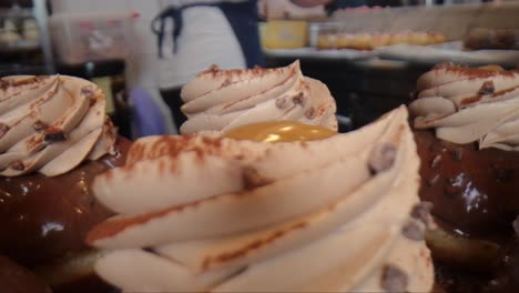 donut being decorated slide movement on a tray