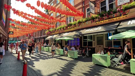 people enjoying a vibrant chinatown street scene