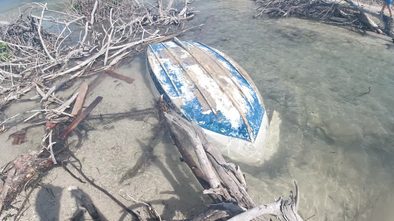 A lost dinghy washed ashore and abandoned on Jost Van Dyke, on the way to bubbly pool in the British Virgin Islands