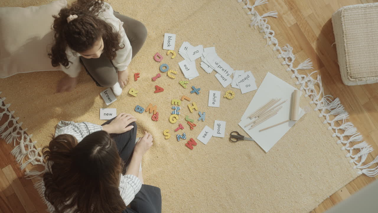 Little Girl and Mom Playing Game with Letters and Word Cards