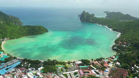 Sunlight-reflection-on-the-turquoise-sea-water-of-Kho-Phi-Phi-Island-overlooking-Andaman-Sea,-Scenic-Phi-Phi-beach-landscape,-Thailand