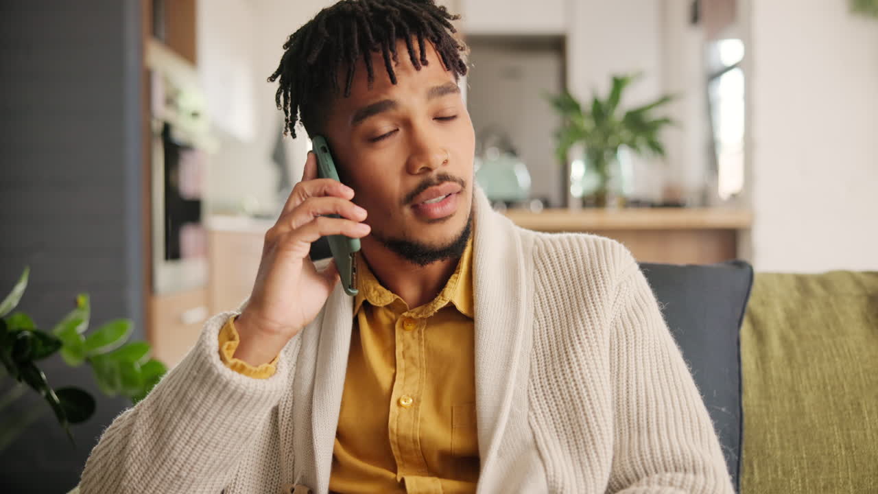 Man Talking on Phone at Home