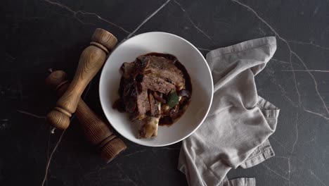 "the beef ribs in sauce is a traditional cretan dish originating from mediterranean cuisine