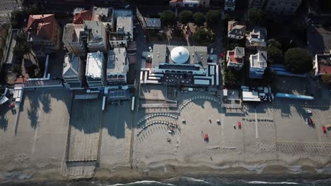 Top-shot-of-a-large-beach-next-to-the-Mediterranean-sea