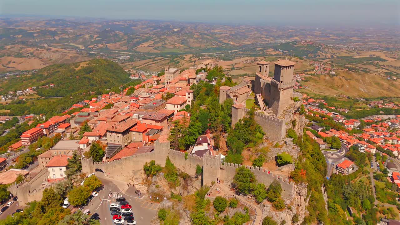 Discover San Marino’s historic fortresses standing proudly over its magnificent, lush landscapes from above.