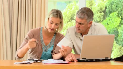 Couple-getting-nervous-because-of-their-bills