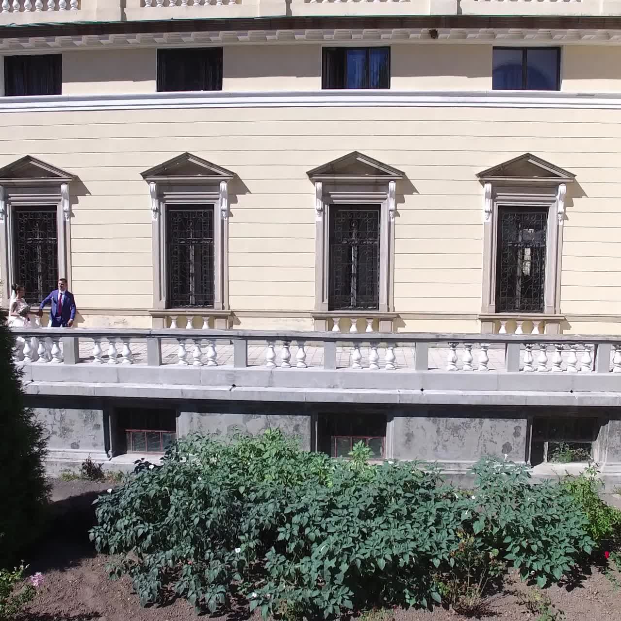 Wedding Couple Near The Old Building