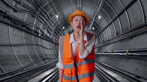woman engineer shouting in a tunnel