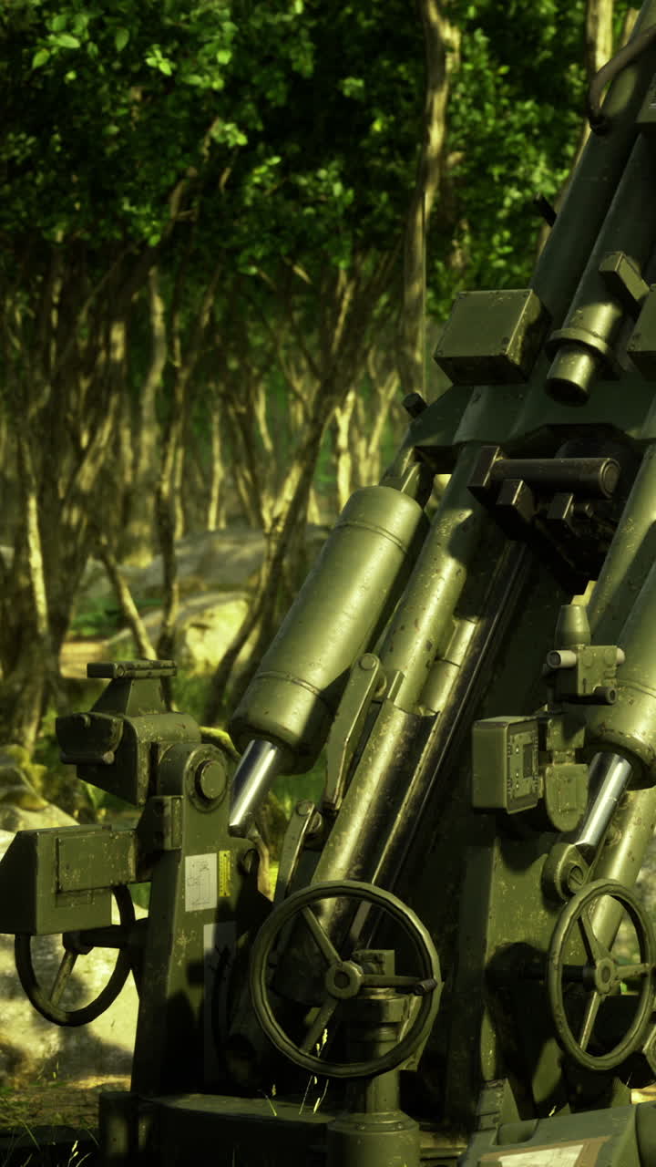 Military artillery positioned in a forest area for a training session
