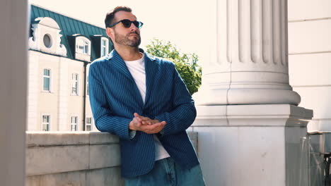 stylish man in a striped blazer