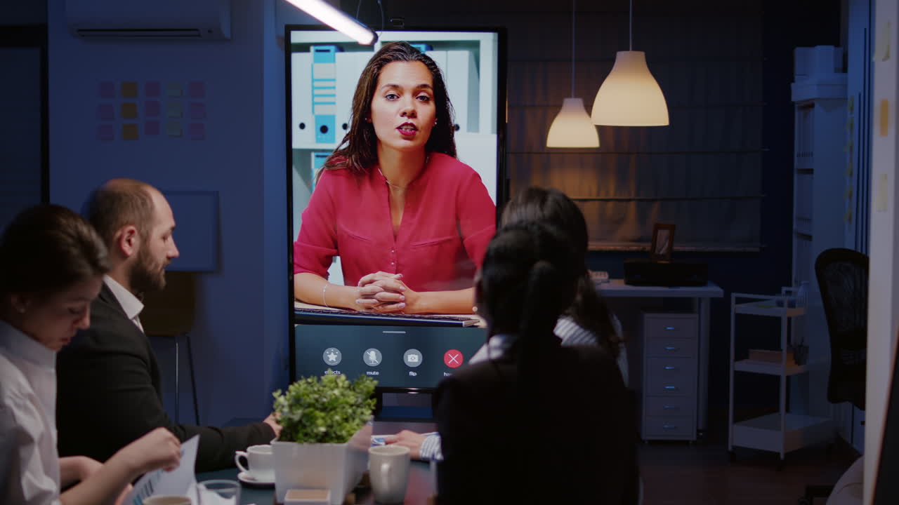 Workaholics multi-ethnic businesspeople discussing financial strategy during online videocall meeting