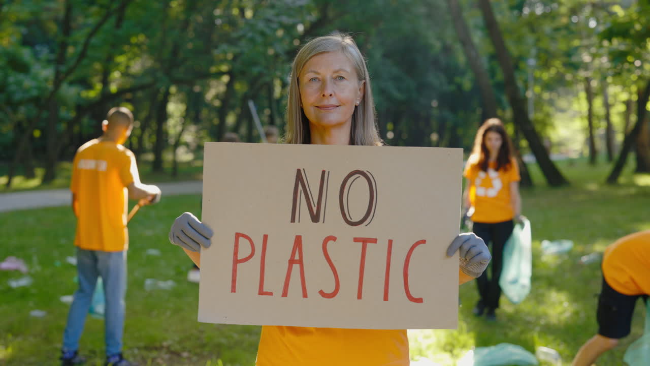 Volunteers protesting against plastic in a park