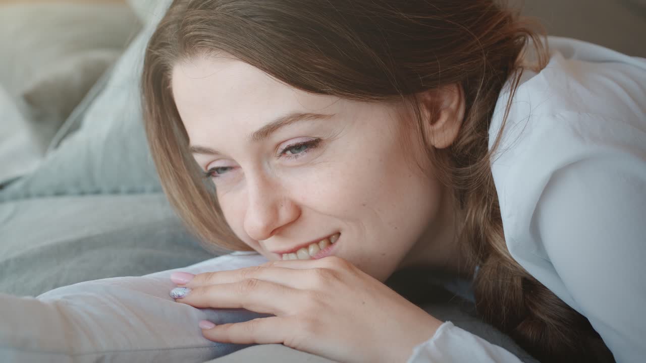 Woman Sleeping Comfortably in Bed