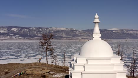 ritual bypassing pilgrims around the buddhist shrine of the stupa of enlightenment.