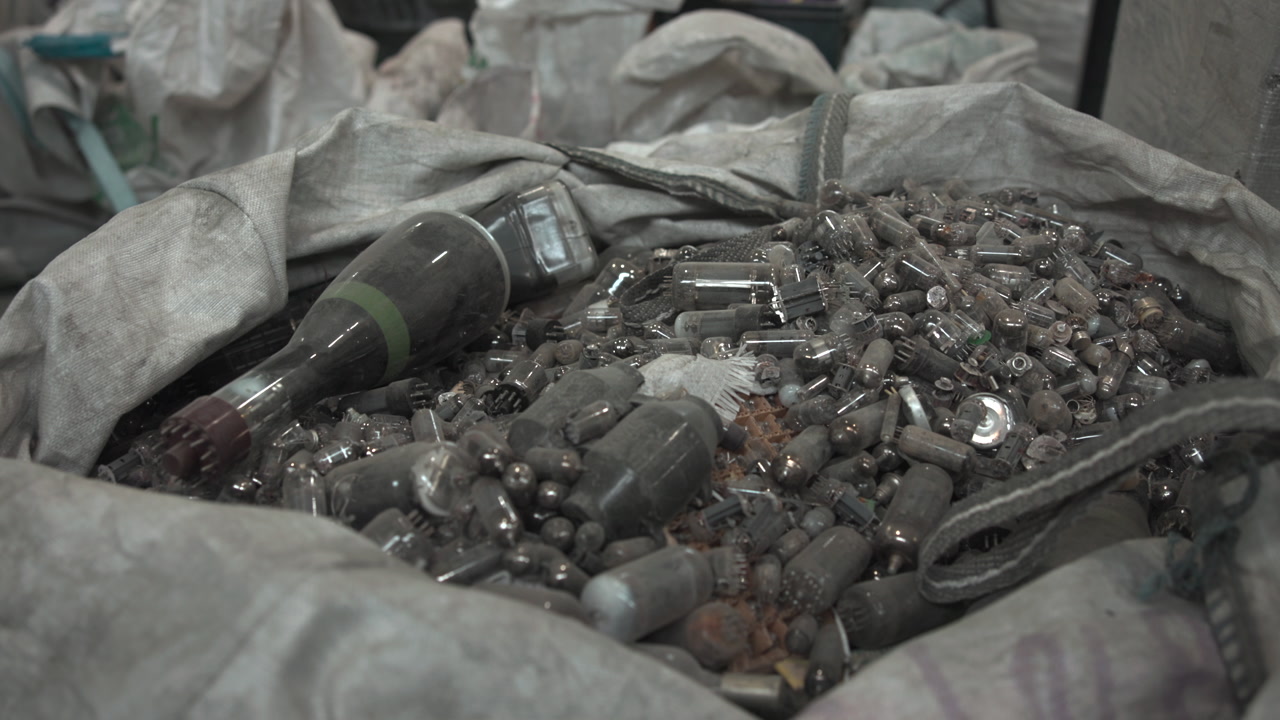 Bag Filled With Glass Tubes And Bulbs, Assorted Vacuum And Signal Tubes Mixed With Hardware, Fragile Recycling . Media