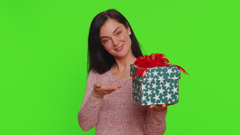 woman holding a christmas gift