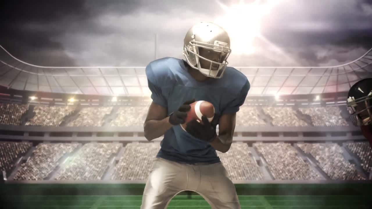 Giocatore di football americano serio che placa per il pallone