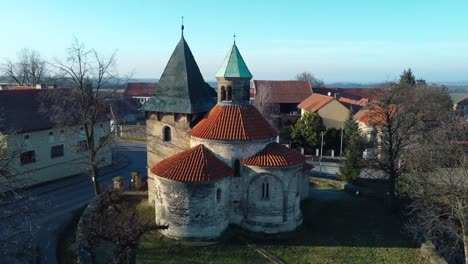 slowly orbiting around the rotunda of the nativity of the virgin mary in a czech village holubice