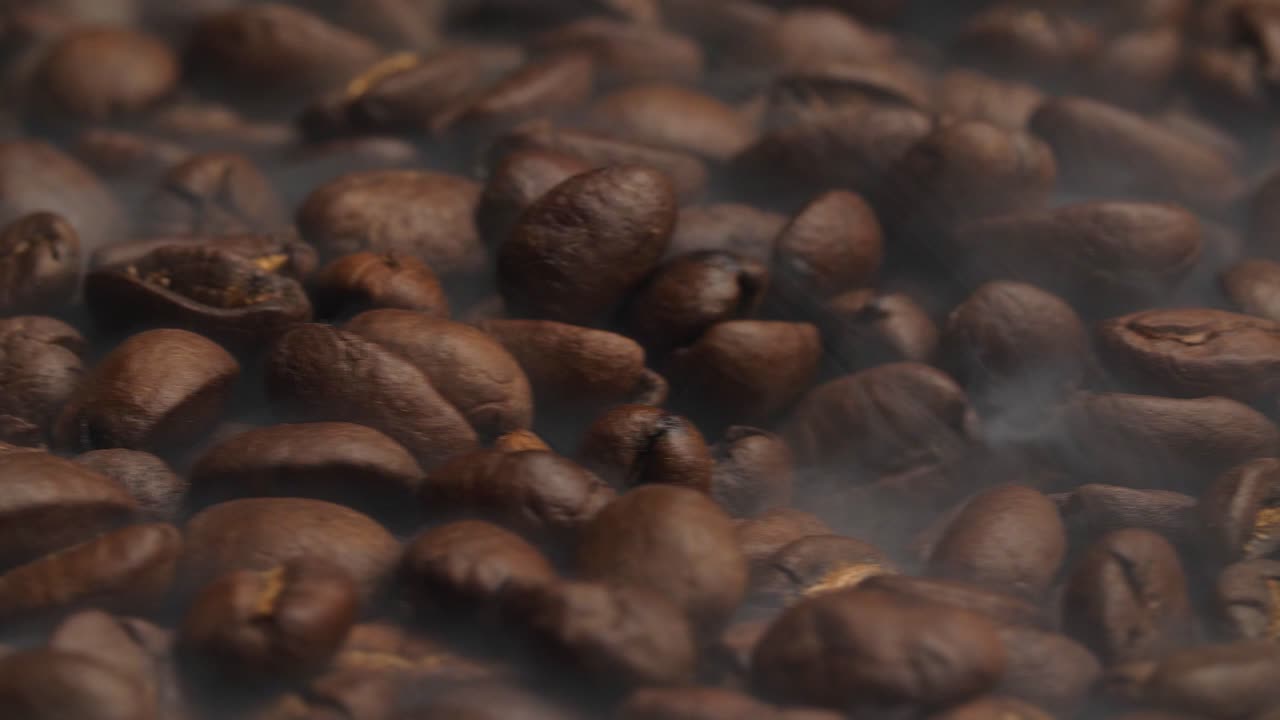 Coffee Beans Fresh Roast Rotating With Smoke, Video In 4K, 50Fps