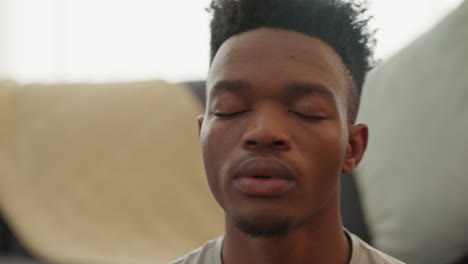 black man, breathe and meditate with living room