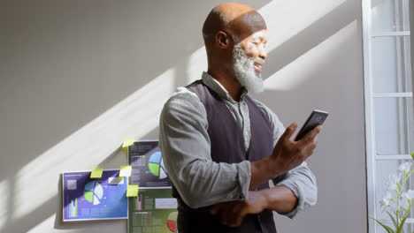 businessman using mobile phone in office 4k