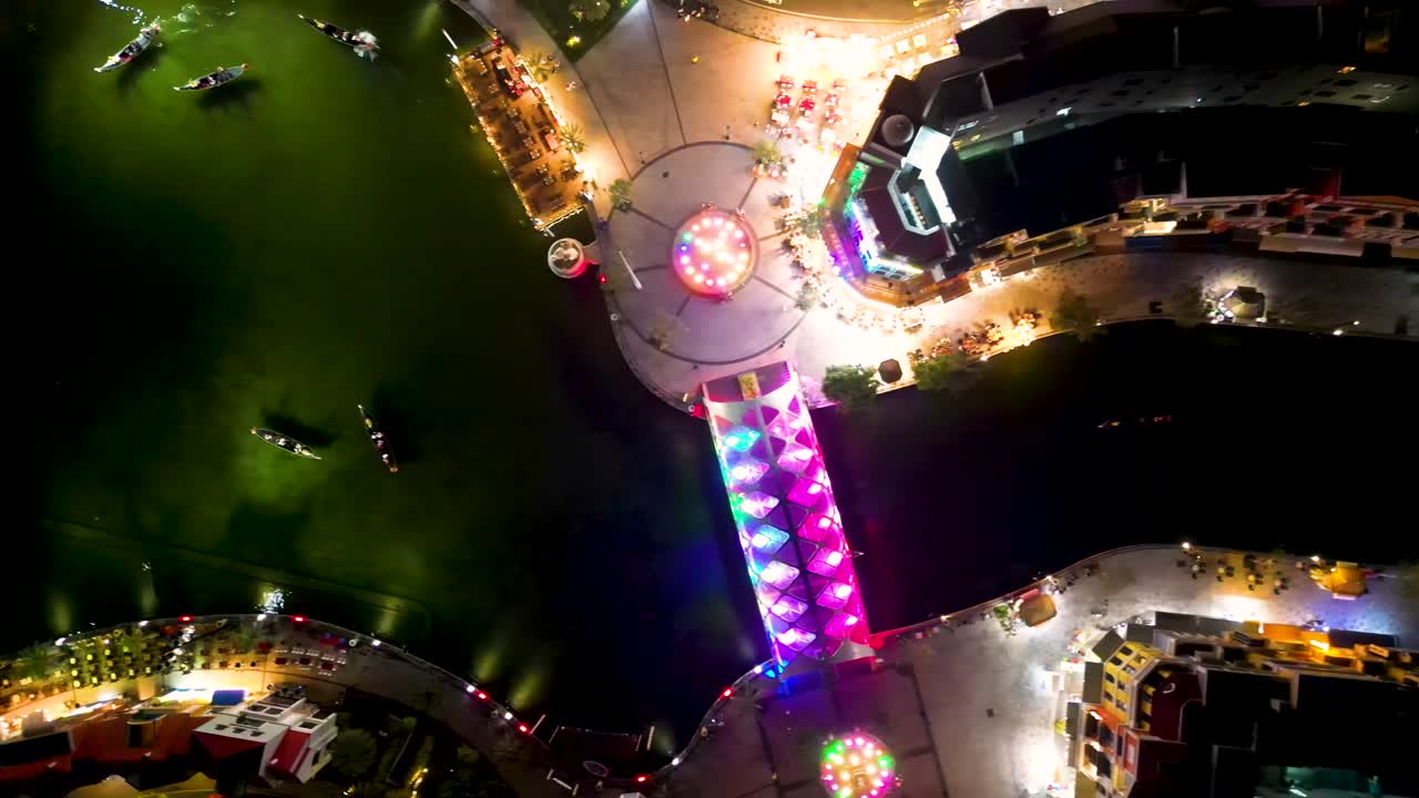 Top-down shot of a vibrant and neon Grand World Phu Quoc at night in Vietnam