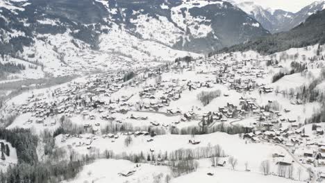 Drone-Aerial-view-of-the-snowy-Grindelwald-and-the-Eiger-in-the-beautiful-swiss-mountain-landscape