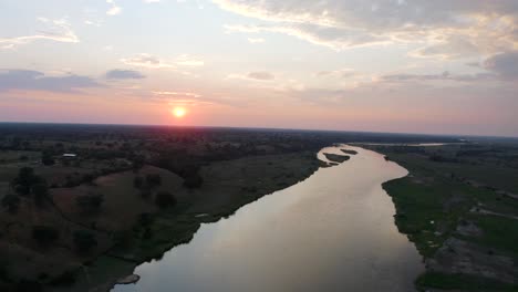 aerial shot of a huge river in africa, during sunset