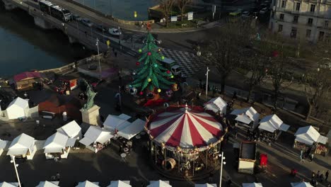 christmas tree and typical french carousel at bayonne, france