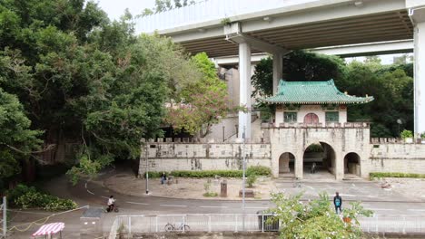 Pok-Ngar-Villa-ornate-gatehouse-remains,-Sha-Tin-area-in-Hong-Kong,-Aerial-view