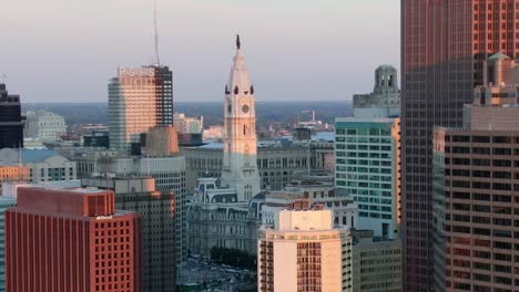 philadelphia cityscape with city hall in the middle, drone revealing empty streets due to lockdown caused by covid pandemic