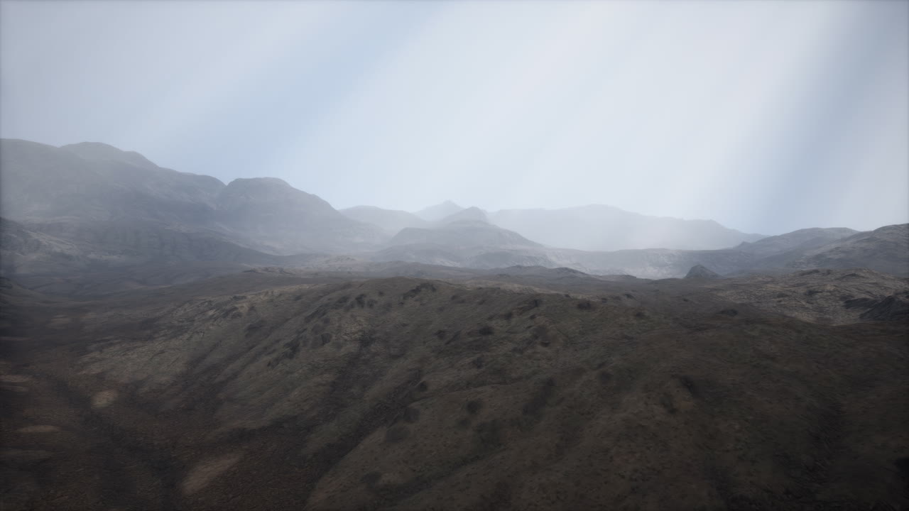 Sun Rays against the Backdrop of the Mountains