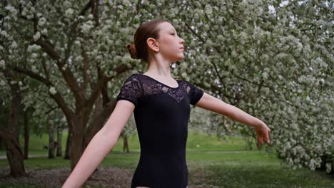 young ballerina in a park
