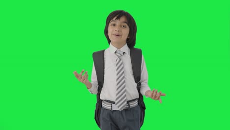 Happy-Indian-school-boy-talking-to-the-camera-Green-screen