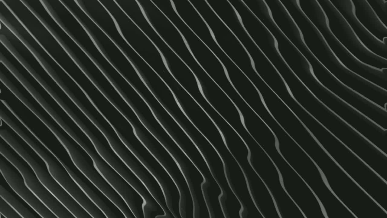 Abstract Gray White Smooth Wavy Lines Pattern Flowing On Black Surface Background - Closeup Shot